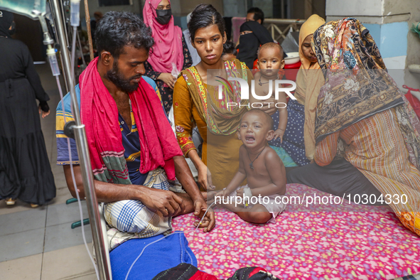 People suffering from dengue fever as they admitted for treatment at a government hospital in Dhaka, Bangladesh, on July 26, 2023. The dengu...