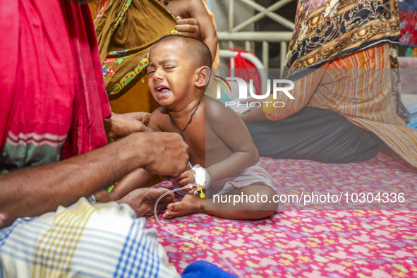 People suffering from dengue fever as they admitted for treatment at a government hospital in Dhaka, Bangladesh, on July 26, 2023. The dengu...