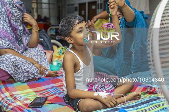 People suffering from dengue fever as they admitted for treatment at a government hospital in Dhaka, Bangladesh, on July 26, 2023. The dengu...