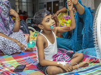 People suffering from dengue fever as they admitted for treatment at a government hospital in Dhaka, Bangladesh, on July 26, 2023. The dengu...