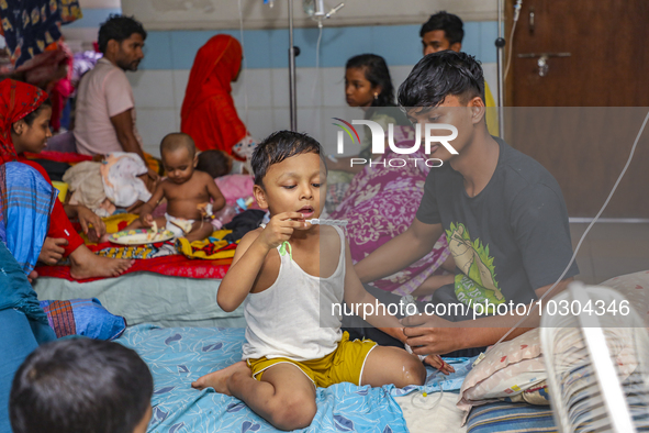 People suffering from dengue fever as they admitted for treatment at a government hospital in Dhaka, Bangladesh, on July 26, 2023. The dengu...