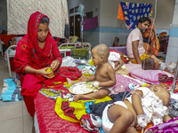 People suffering from dengue fever as they admitted for treatment at a government hospital in Dhaka, Bangladesh, on July 26, 2023. The dengu...