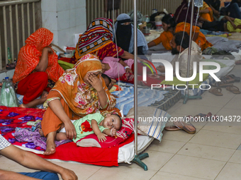 People suffering from dengue fever as they admitted for treatment at a government hospital in Dhaka, Bangladesh, on July 26, 2023. The dengu...