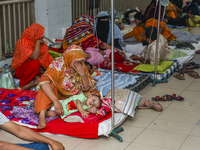 People suffering from dengue fever as they admitted for treatment at a government hospital in Dhaka, Bangladesh, on July 26, 2023. The dengu...