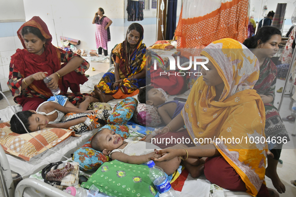 People suffering from dengue fever as they admitted for treatment at a government hospital in Dhaka, Bangladesh, on July 26, 2023. The dengu...