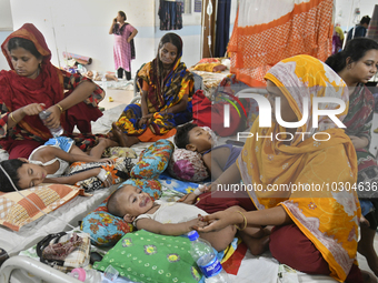 People suffering from dengue fever as they admitted for treatment at a government hospital in Dhaka, Bangladesh, on July 26, 2023. The dengu...