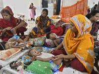 People suffering from dengue fever as they admitted for treatment at a government hospital in Dhaka, Bangladesh, on July 26, 2023. The dengu...