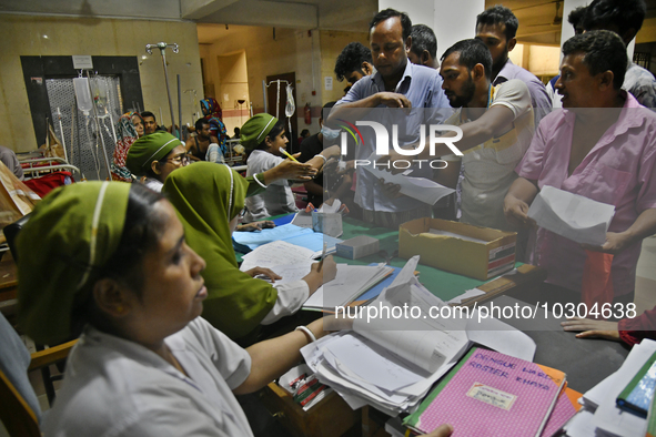 People suffering from dengue fever as they admitted for treatment at a government hospital in Dhaka, Bangladesh, on July 26, 2023. The dengu...