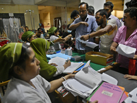 People suffering from dengue fever as they admitted for treatment at a government hospital in Dhaka, Bangladesh, on July 26, 2023. The dengu...