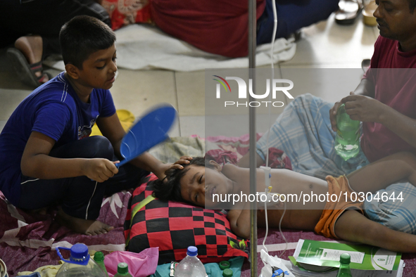 People suffering from dengue fever as they admitted for treatment at a government hospital in Dhaka, Bangladesh, on July 26, 2023. The dengu...