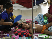 People suffering from dengue fever as they admitted for treatment at a government hospital in Dhaka, Bangladesh, on July 26, 2023. The dengu...