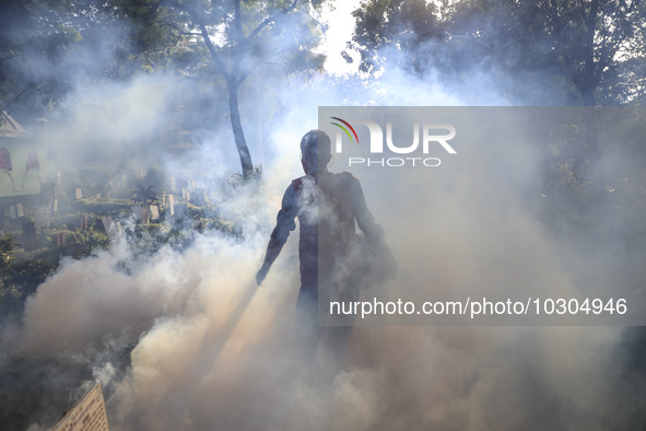 A city corporation worker fumigates as the mosquito-borne dengue infection situation worsens in Dhaka, Bangladesh on July 26, 2023. At least...