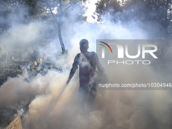 A city corporation worker fumigates as the mosquito-borne dengue infection situation worsens in Dhaka, Bangladesh on July 26, 2023. At least...