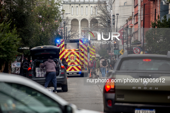 
Firefighters respond to a gas explosion emergency at a residential building in Osorno on July 26, 2023. 