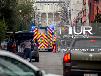 
Firefighters respond to a gas explosion emergency at a residential building in Osorno on July 26, 2023. (