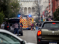 
Firefighters respond to a gas explosion emergency at a residential building in Osorno on July 26, 2023. (