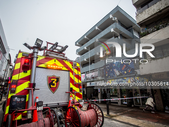 
Firefighters respond to a gas explosion emergency at a residential building in Osorno on July 26, 2023. (