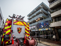 
Firefighters respond to a gas explosion emergency at a residential building in Osorno on July 26, 2023. (