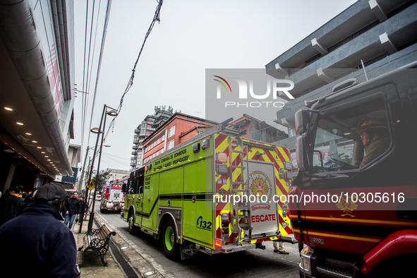 
Firefighters respond to a gas explosion emergency at a residential building in Osorno on July 26, 2023. 