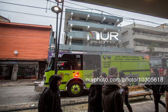 
Firefighters respond to a gas explosion emergency at a residential building in Osorno on July 26, 2023. 