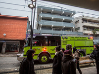 
Firefighters respond to a gas explosion emergency at a residential building in Osorno on July 26, 2023. (