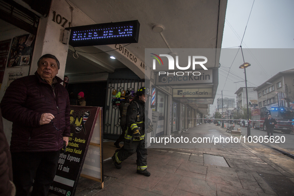 
Firefighters respond to a gas explosion emergency at a residential building in Osorno on July 26, 2023. 