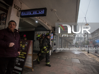 
Firefighters respond to a gas explosion emergency at a residential building in Osorno on July 26, 2023. (