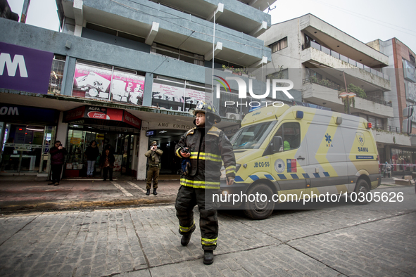 
Firefighters respond to a gas explosion emergency at a residential building in Osorno on July 26, 2023. 