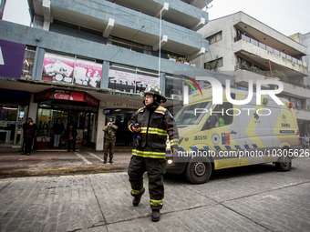 
Firefighters respond to a gas explosion emergency at a residential building in Osorno on July 26, 2023. (