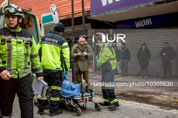 
Firefighters respond to a gas explosion emergency at a residential building in Osorno on July 26, 2023. 