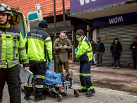 
Firefighters respond to a gas explosion emergency at a residential building in Osorno on July 26, 2023. (