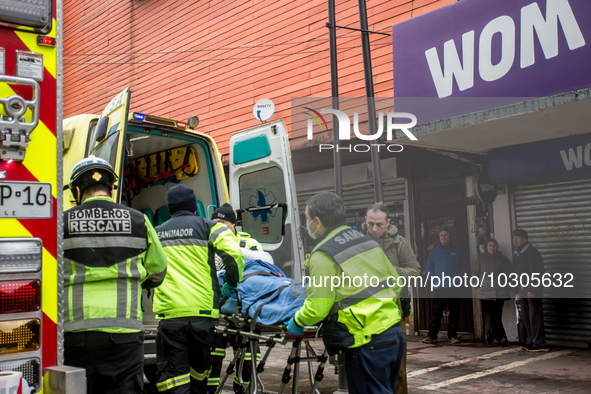 
Firefighters respond to a gas explosion emergency at a residential building in Osorno on July 26, 2023. 