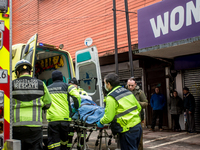 
Firefighters respond to a gas explosion emergency at a residential building in Osorno on July 26, 2023. (