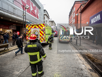 
Firefighters respond to a gas explosion emergency at a residential building in Osorno on July 26, 2023. (