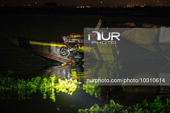 A view of the capsized boat in Laguna Lake that killed more than 20 people, in Binangonan, Rizal Province, Philippines, on July 27, 2023. 