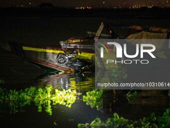 A view of the capsized boat in Laguna Lake that killed more than 20 people, in Binangonan, Rizal Province, Philippines, on July 27, 2023. (