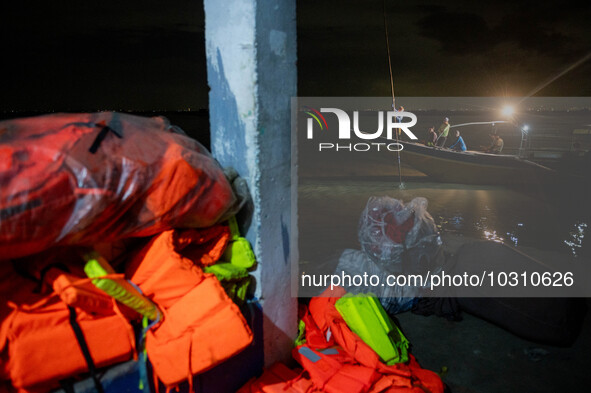 A boat passes by in Laguna Lake where another boat capsized killing more than 20 people, in Binangonan, Rizal Province, Philippines, on July...