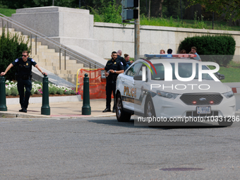 Police block an entrance to the U.S. Capitol grounds after reports of an active shooter at or near the Russell Senate Office Building in Was...