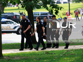 U.S. Capitol Police respond to reports of an active shooter at or near the Russell Senate Office Building in Washington, D.C. on August 2, 2...