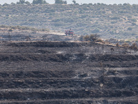 A fire track is patrolling the area, Alassa, Cyprus, on Aug. 5, 2023. Fire Department and Forest Department units, patrol the area around Al...