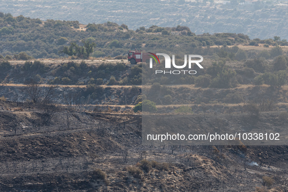 A fire track is patrolling the area, Alassa, Cyprus, on Aug. 5, 2023. Fire Department and Forest Department units, patrol the area around Al...