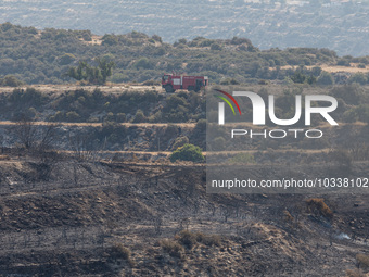 A fire track is patrolling the area, Alassa, Cyprus, on Aug. 5, 2023. Fire Department and Forest Department units, patrol the area around Al...