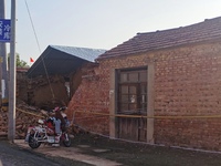 DEZHOU, CHINA - AUGUST 6, 2023 - The wall of a residential house collapsed after an earthquake in the urban area of Pingyuan County, Dezhou,...