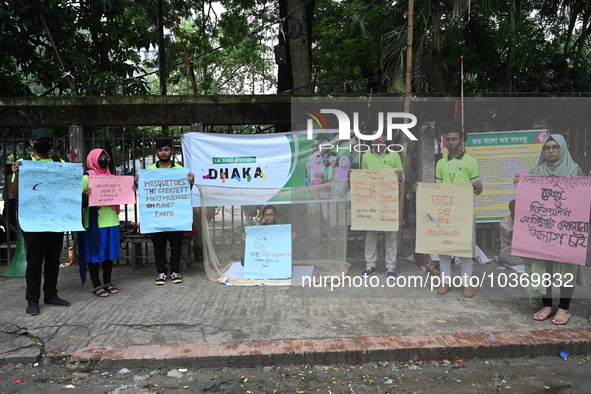 Activist of a social organization hold placards during an awareness campaign against mosquito-borne diseases, in Dhaka, Bangladesh, on Augus...