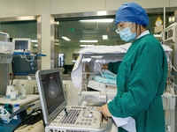 TENGZHOU, CHINA - AUGUST 17, 2023 - A neonatal nurse gives a color ultrasound examination to a child in Tengzhou city, Shandong province, Ch...