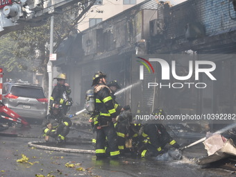 5-alarm fire in Brooklyn, New York, United States on August 20, 2023 damages several stores on Lee Avenue Sunday. Several firefighters were...