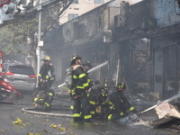 5-alarm fire in Brooklyn, New York, United States on August 20, 2023 damages several stores on Lee Avenue Sunday. Several firefighters were...