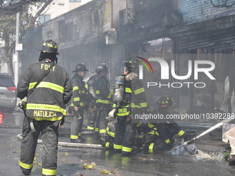 5-alarm fire in Brooklyn, New York, United States on August 20, 2023 damages several stores on Lee Avenue Sunday. Several firefighters were...