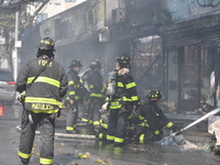 5-alarm fire in Brooklyn, New York, United States on August 20, 2023 damages several stores on Lee Avenue Sunday. Several firefighters were...