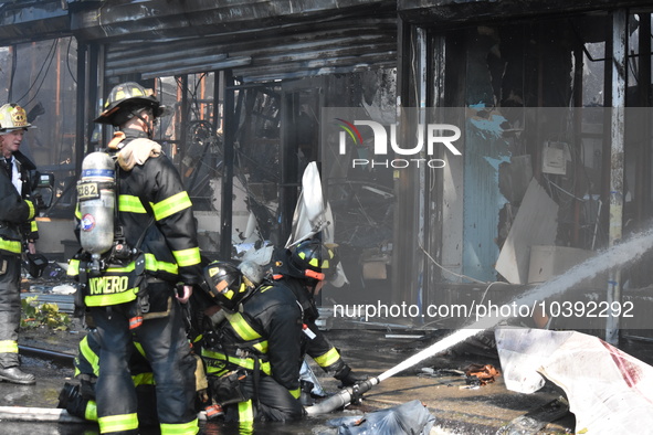 5-alarm fire in Brooklyn, New York, United States on August 20, 2023 damages several stores on Lee Avenue Sunday. Several firefighters were...